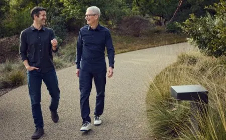 Apple executives Tim Cook and John Ternus appear together during a corporate announcement.