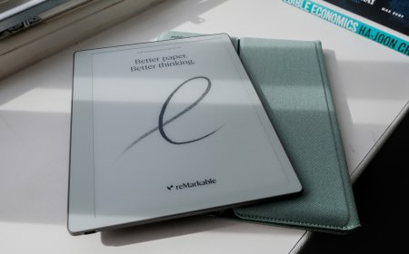 The reMarkable Paper Pure e-paper tablet rests on a desk with its stylus placed beside it.