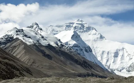 American climber Tyler Andrews summits Mount Everest in nine hours and fifty-five minutes, breaking the speed record.