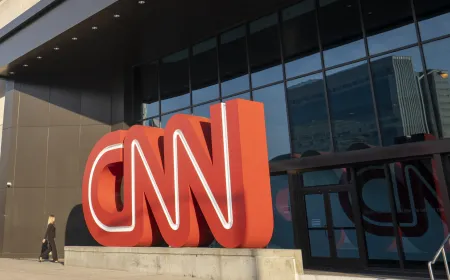 CNN and Perplexity AI logos alongside legal documents illustrating the copyright infringement lawsuit