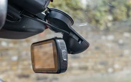 A dashboard camera records road footage for fleet monitoring purposes.