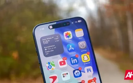 iOS 27 interface on an iPhone showing AI writing assistance and system automation features.