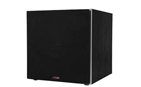 A black subwoofer sits in a living room corner next to a calibration microphone.