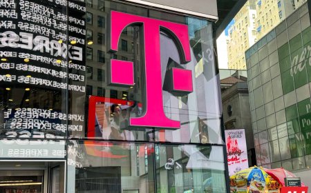 T-Mobile T-Life mandate policy document displayed on a desk