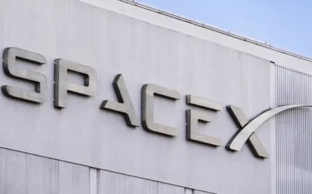 A SpaceX Starship rocket stands on the launch pad.