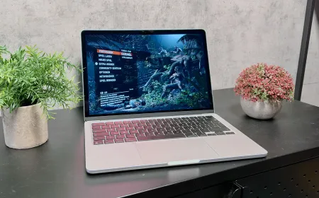 The Apple M5 MacBook Air laptop displays its silver chassis and keyboard layout.