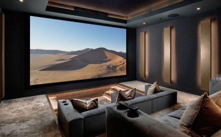 Custom home theater featuring a 9.4.4 Dolby Atmos speaker layout designed for sports viewing.