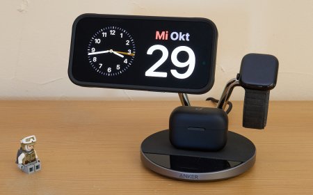 The Anker Prime charging station powers an iPhone, Apple Watches, and AirPods using dedicated wireless zones and a display.
