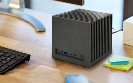 Bleu Jour Kubb Fanless mini PC featuring a sculpted aluminum chassis and vertical heat-dissipating fins.