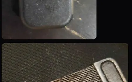 This image shows a Steam Controller charging puck with exposed power pins and damage from a documented short circuit.