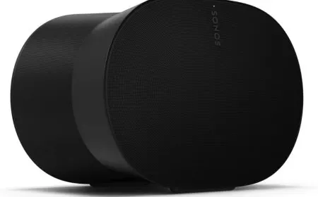 The Sonos Era 300 wireless speaker sits on a clean surface with its circular driver array clearly visible.
