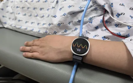 The Samsung Galaxy Watch displays heart rate metrics used for fainting prediction.