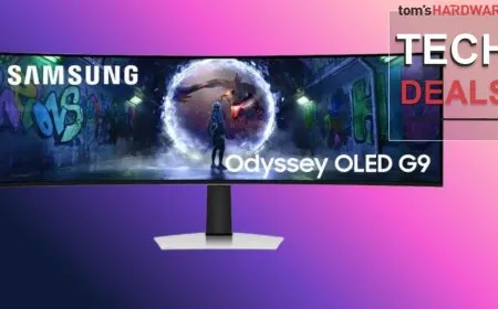 Front view of a 49-inch Samsung Odyssey OLED G9 curved gaming monitor with a slim bezel design.
