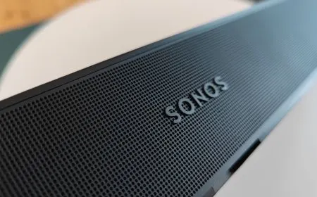 The Sonos Beam Gen 2 soundbar rests on a media console.