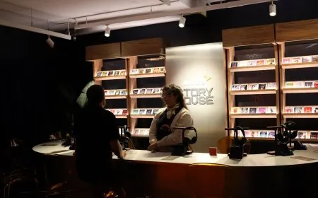 Visitors experience immersive spatial audio at a Manhattan pop-up event showcasing Dolby Atmos audiobook technology.