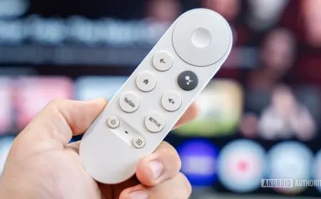 A first-generation Chromecast device is plugged into a television HDMI port.