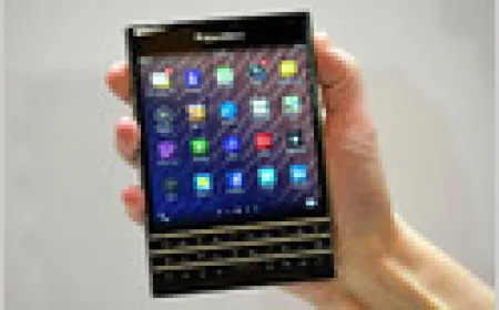 A chart displays BlackBerry stock gains alongside QNX automotive software developments.