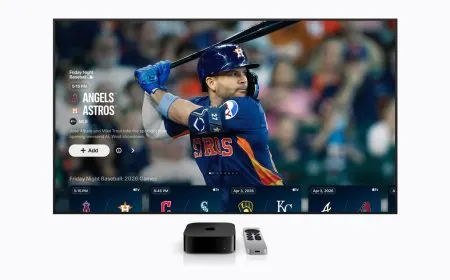 A baseball field is illuminated under stadium lights during a Friday Night Baseball broadcast on Apple TV.