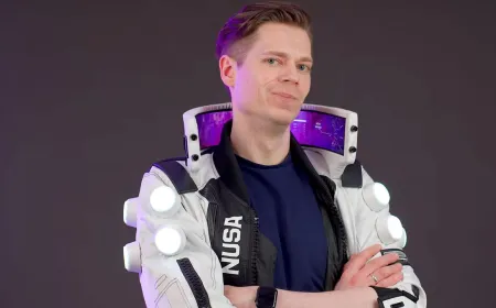 The tall collar of a NUSA Infiltrator cosplay jacket displays four flexible OLED panels powered by dual Raspberry Pi 4 boa...