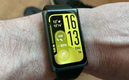 The Huawei Band 11 Pro fitness tracker features a polished aluminum case and a rectangular AMOLED display.