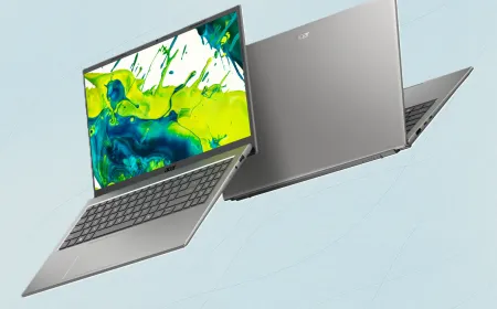 Budget Windows laptops are arranged on a desk to showcase their compact designs and efficient hardware.