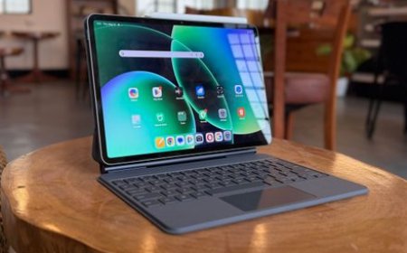 The Xiaomi Pad 8 Pro tablet is shown at an angle to highlight its thin bezels and rear camera array.