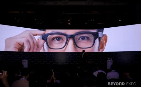 iFlytek displays its 40g AI smart glasses equipped with the GlassClaw agent and advanced noise recognition.