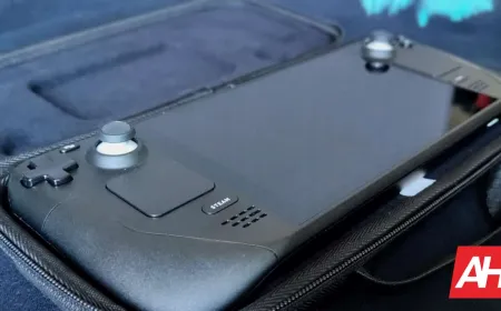 A Steam Deck handheld gaming console rests on a flat surface.