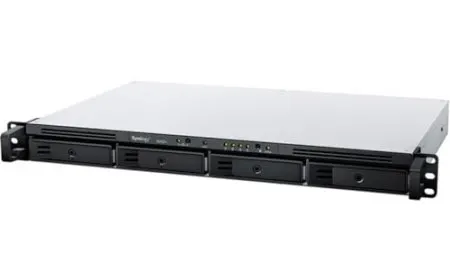 A rackmount network-attached storage unit sits in a server rack for small office data management.