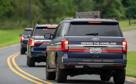 A concealed federal license plate is mounted on a vehicle.