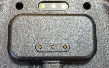 The magnetic charging puck for the Steam Controller displays exposed metal contact points.