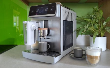 Philips Cafe Aromis 8000 Series automated espresso machine featuring dual milk carafes and app connectivity.