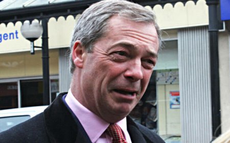 Nigel Farage addresses reporters regarding his allegations of a Russian phone hack.