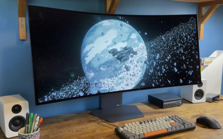 The LG Ultragear Evo GX9 39-inch OLED monitor sits on a desk with a dark gaming interface on screen.