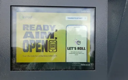 An InPost locker displays a Microsoft Windows activation warning on its screen.