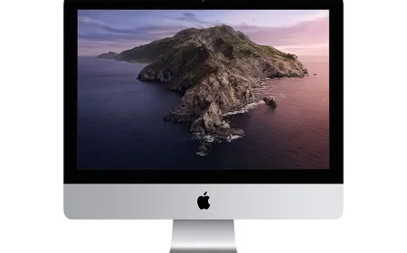 A refurbished 2019 Apple iMac desktop displays its 21.5-inch Retina 4K screen and silver stand.