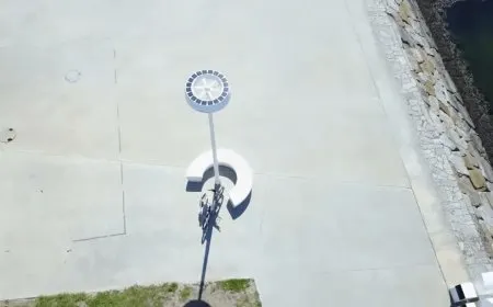 Smart streetlight poles feature integrated electric vehicle charging ports and secure data routing modules for urban conne...