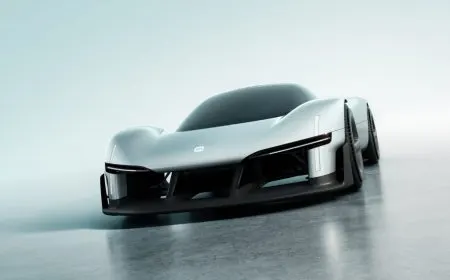 The Xiaomi Vision GT two-door concept car is displayed with its aerodynamic design and connectivity features visible.