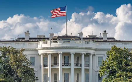 A smartphone screen displays the White House mobile application on a federal government device.