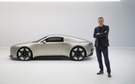 Workers assemble Audi vehicles on a production line customized for regional markets.