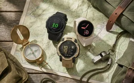 Garmin Vivoactive 6, Forerunner 265, and Instinct 3 fitness watches are displayed together.