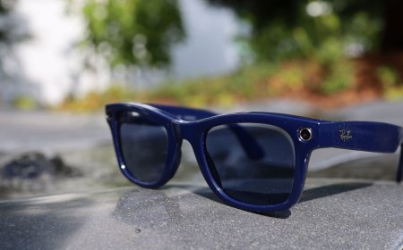 The Ray-Ban Meta Gen 2 Wayfarer smart glasses are shown on a neutral surface.