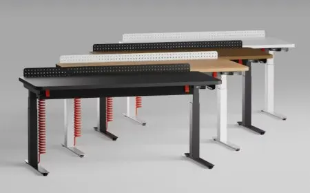 The Herman Miller Coyl gaming desk features a motor-driven height adjustment system and integrated cable management.