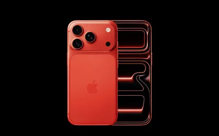 An unfinished iPhone prototype chassis displays a raw metal finish alongside exposed internal hardware components.