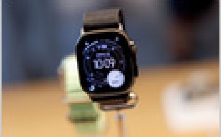 The Apple Watch displays health tracking data on its screen.