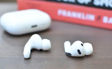 Apple AirPods prototypes with integrated cameras for contextual awareness and Siri navigation.