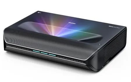 An ultra short throw projector displays a large screen from minimal distance when mounted near a wall.