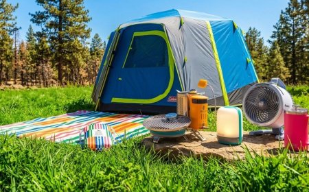 A modular glamping tent features insulated walls, a comfortable sleeping area, and LED lighting.