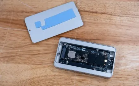 Compact ORICO X50 Thunderbolt 5 portable SSD enclosure featuring a fanless passive cooling design.