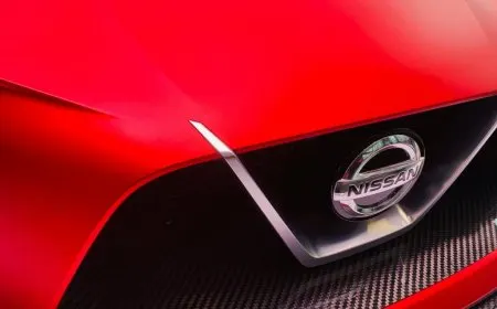 Nissan and Dongfeng executives sign a joint venture agreement for a new import export company in Guangzhou.